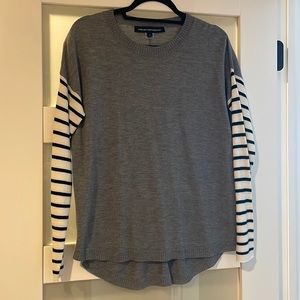 Gray sweater with striped sleeves